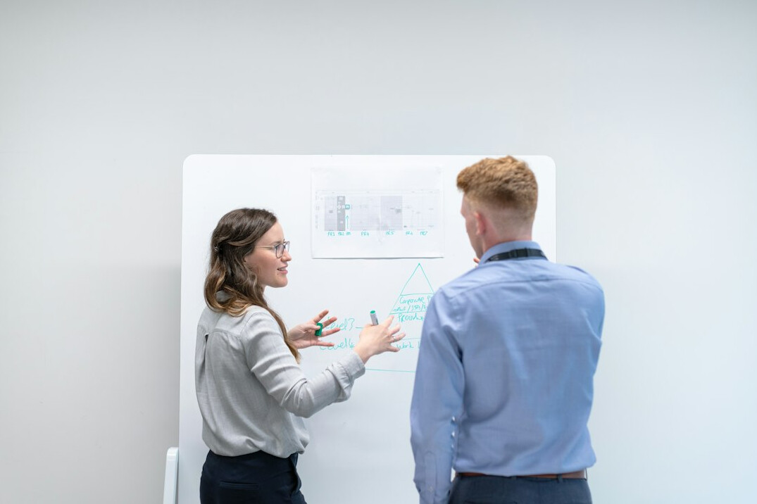 business team discussing software